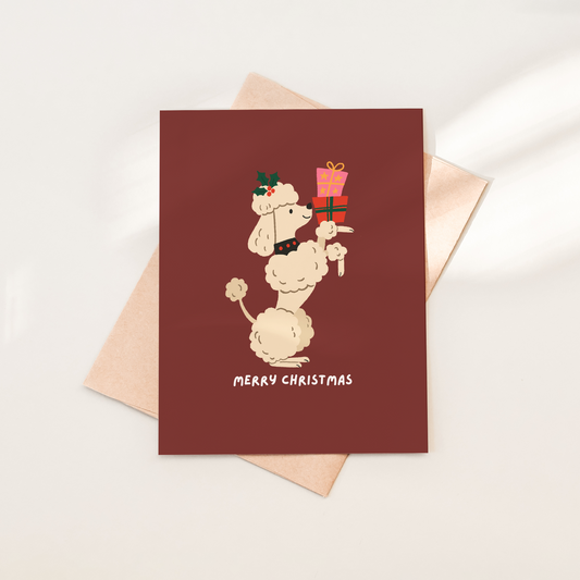 Christmas card with a dog illustration and 'Merry Christmas' text on a red background.